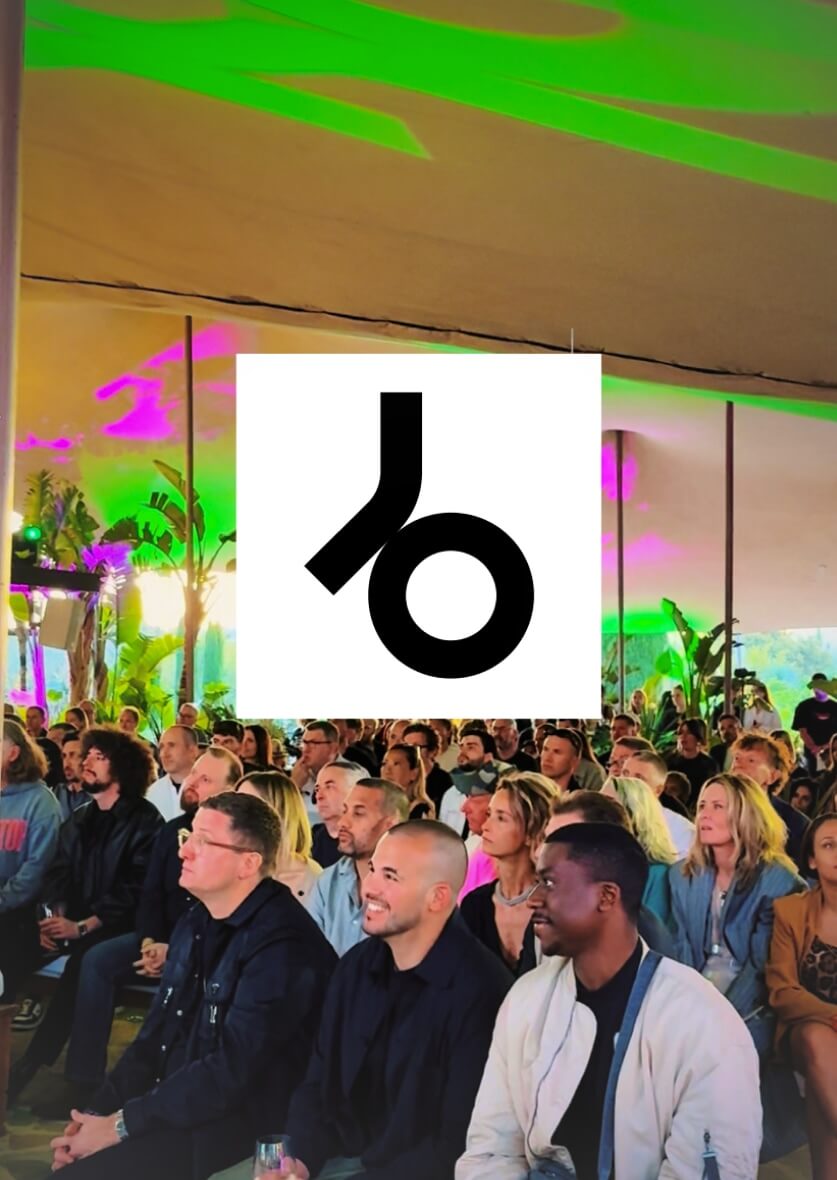 Audience at Beatport event in Ibiza under colorful lights—professional music and event content creation by vIBZ Marketing